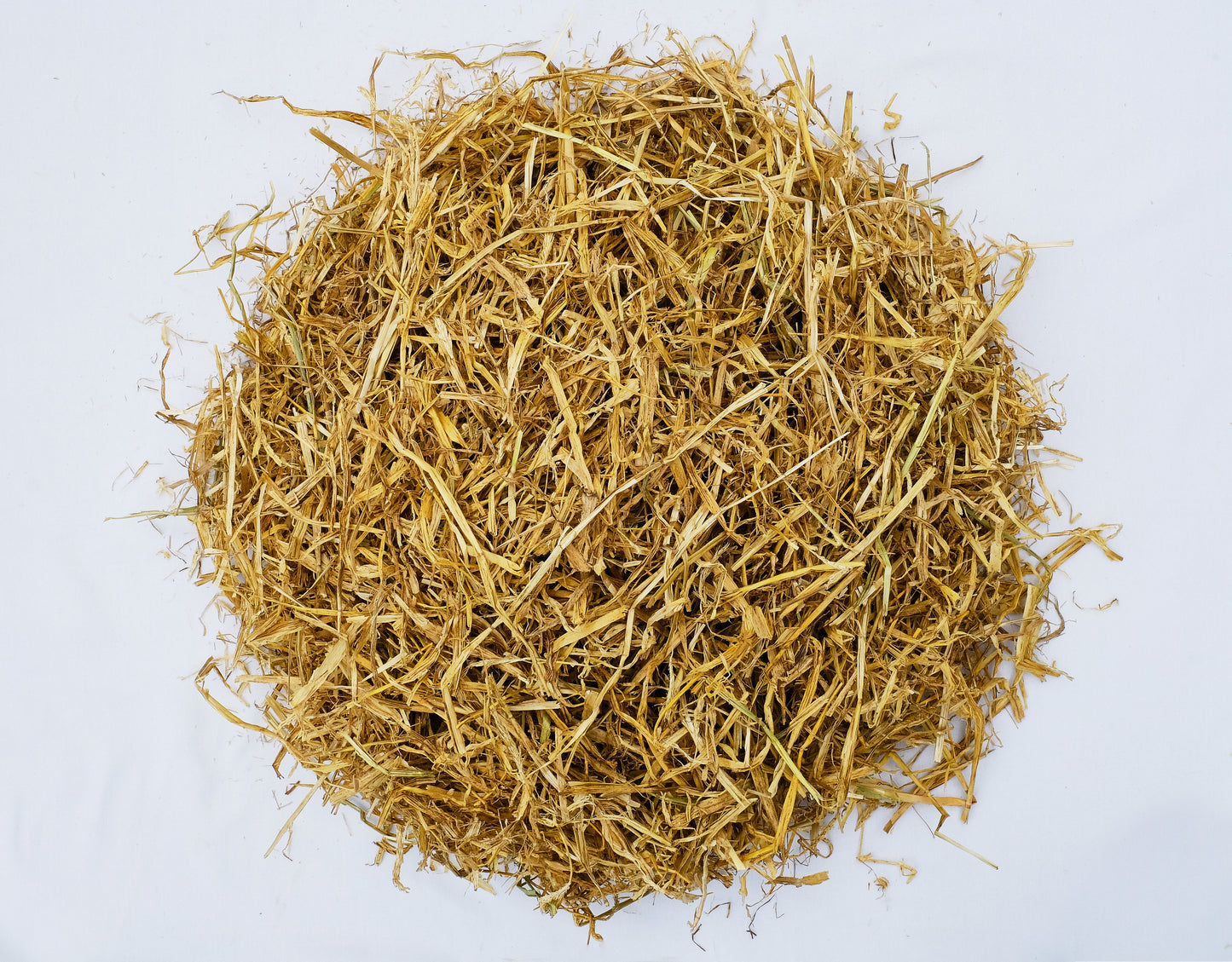 Pile of straw on a white background