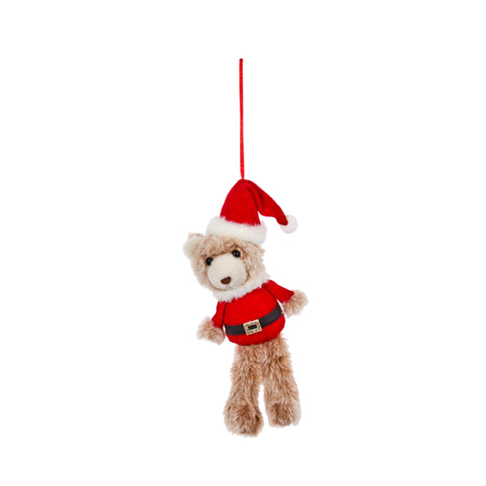 Plush teddy bear in Santa outfit hanging on a white background