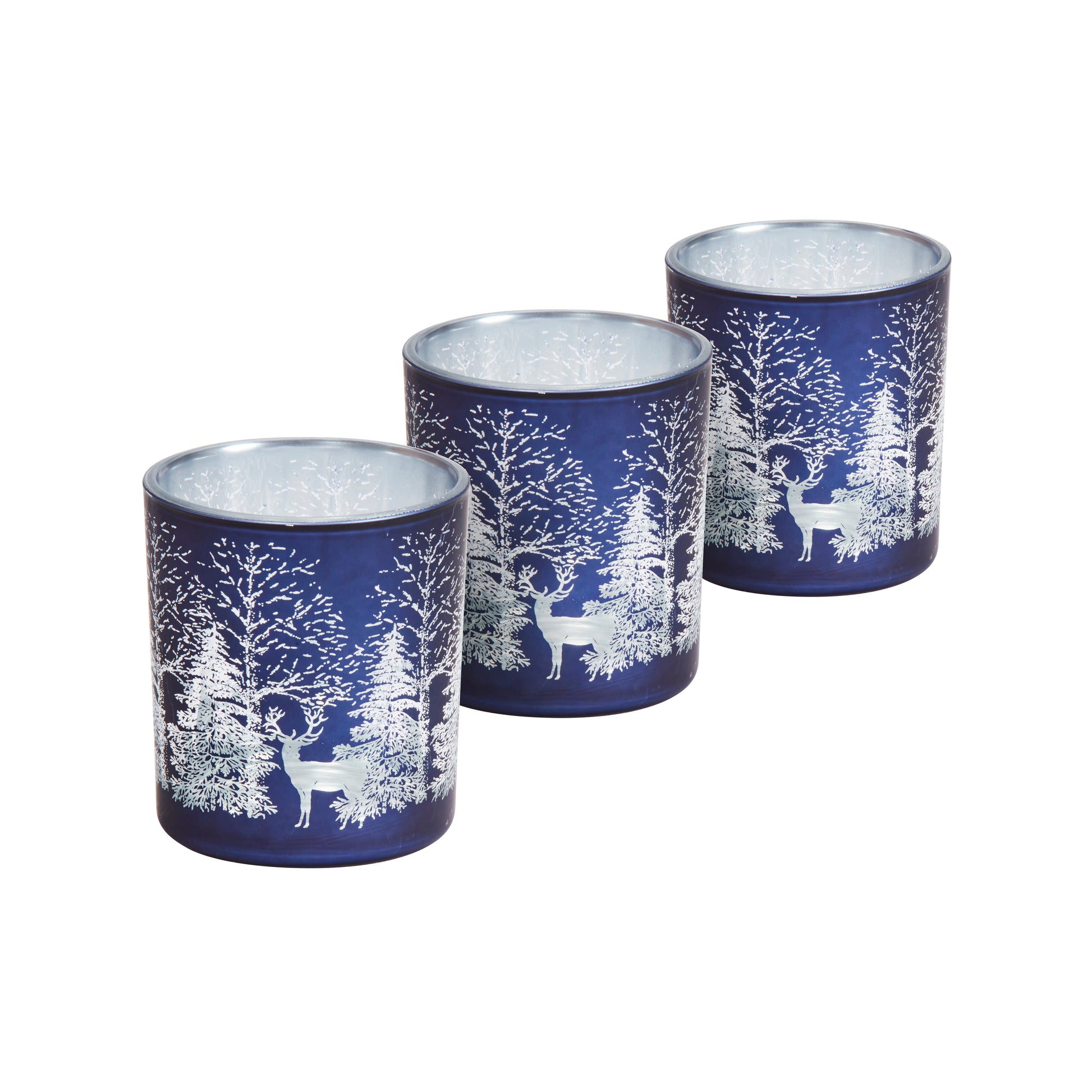 Set of three blue candle holders with white deer and forest design on a white background