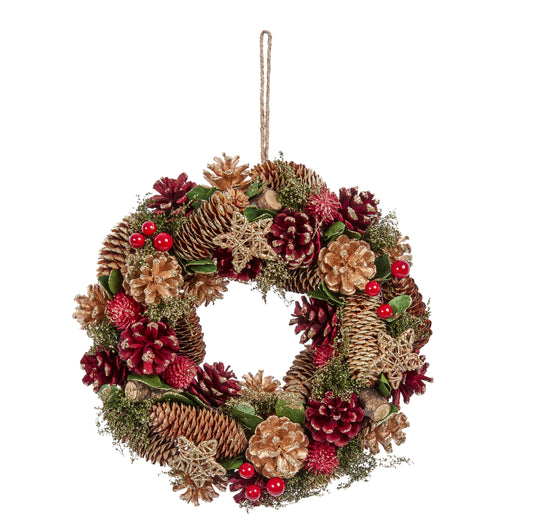 Decorative wreath with pinecones, berries, and flowers on a white background