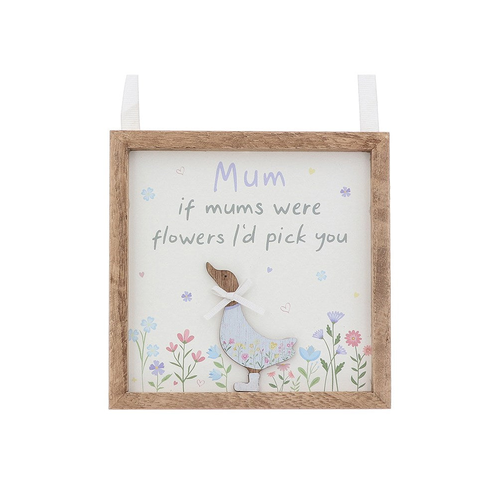 Decorative wall hanging with a wooden frame, floral design, and text on a white background.