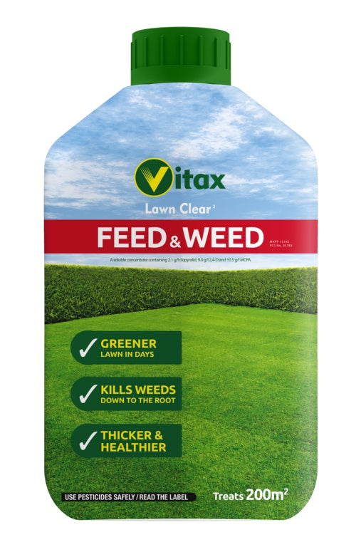 Vitax lawn care product bottle with grassy field and sky design on a white background