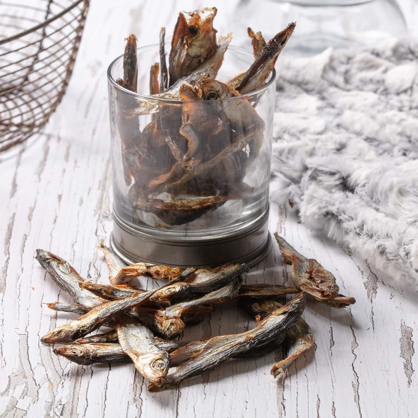 Hollings Sprats in a glass on a table