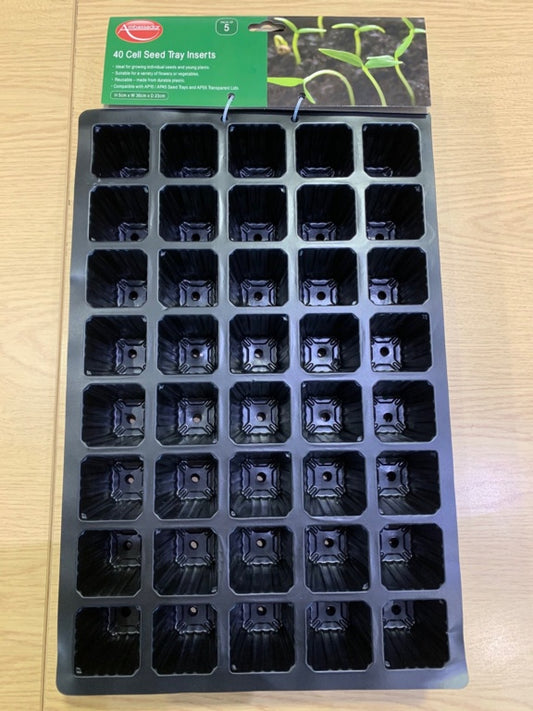 Seed tray insert with 48 compartments on a wooden surface