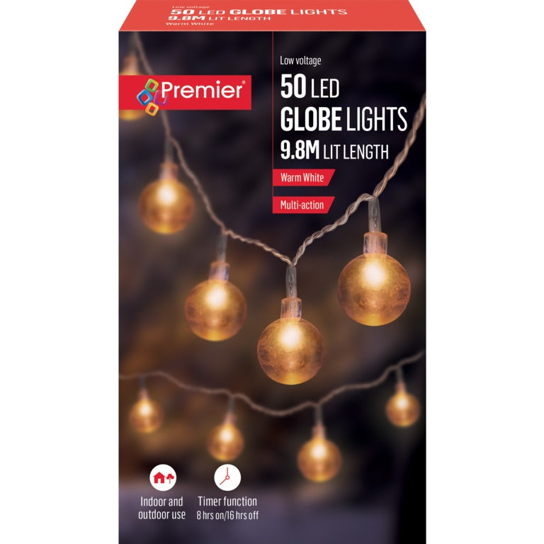 Box of Premier 50 LED globe lights with warm white bulbs on a dark background