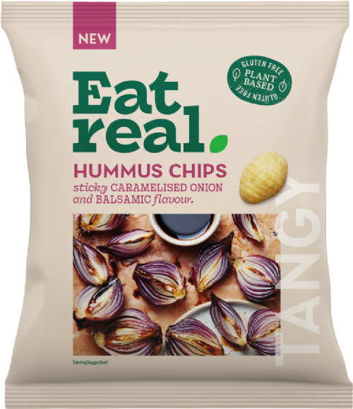 Packaging of Eat Real hummus chips with caramelised onions and balsamic flavor on a beige background.
