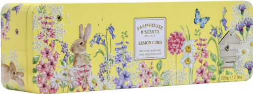 Biscuit tin with floral design, rabbit illustration, and lemon curd flavor label on a yellow background.