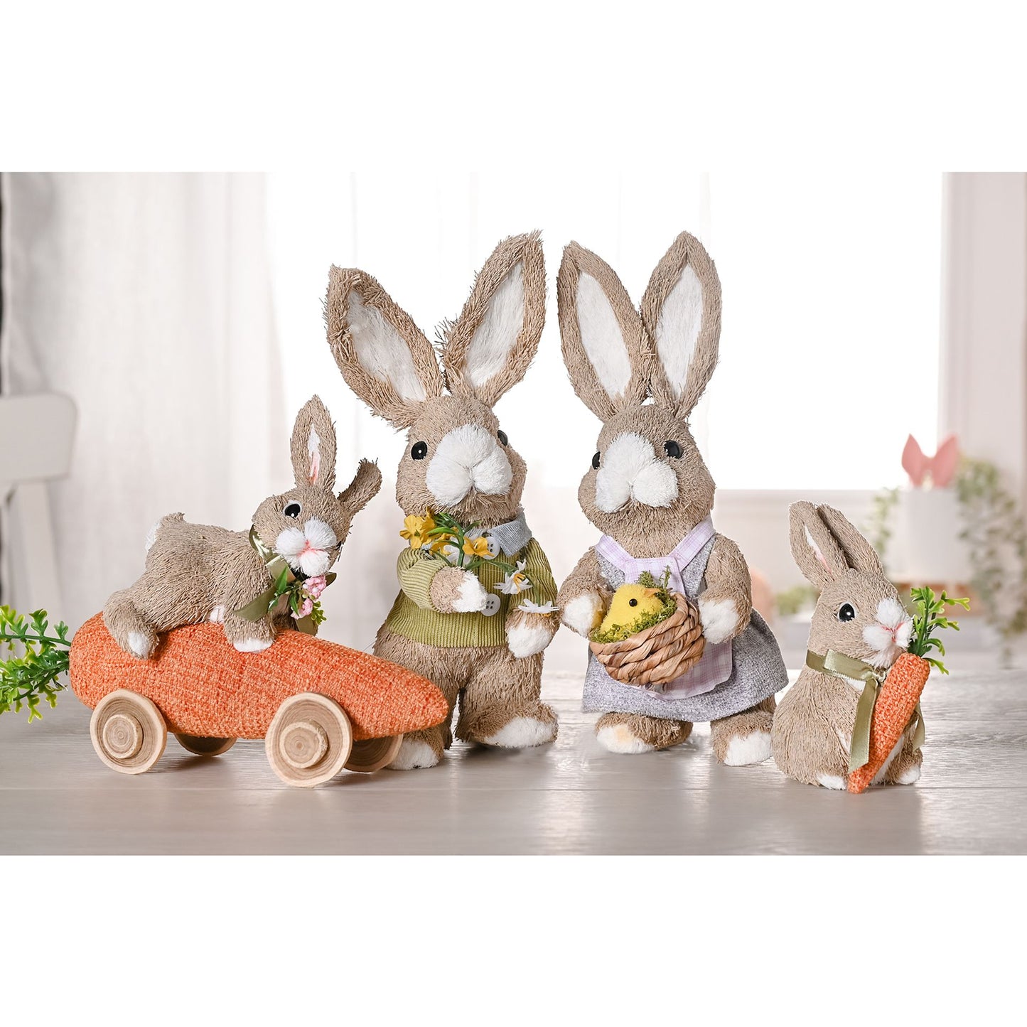 Set of plush rabbit toys with accessories on a white surface