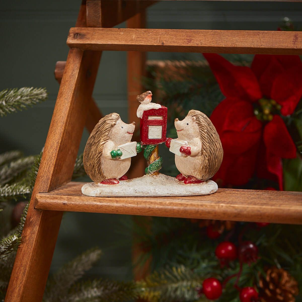 Christmas Hedgehogs and Postbox Figure | Resin ornament of two hedgehogs holding letters next to a snowy red postbox | UK seasonal animal decoration