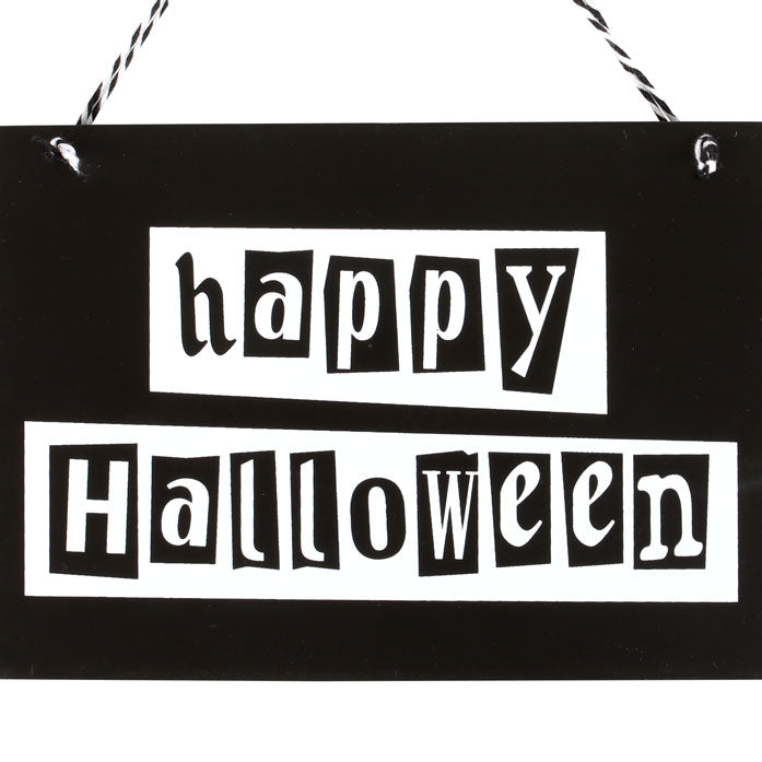 Black sign with 'happy Halloween' text on a white background