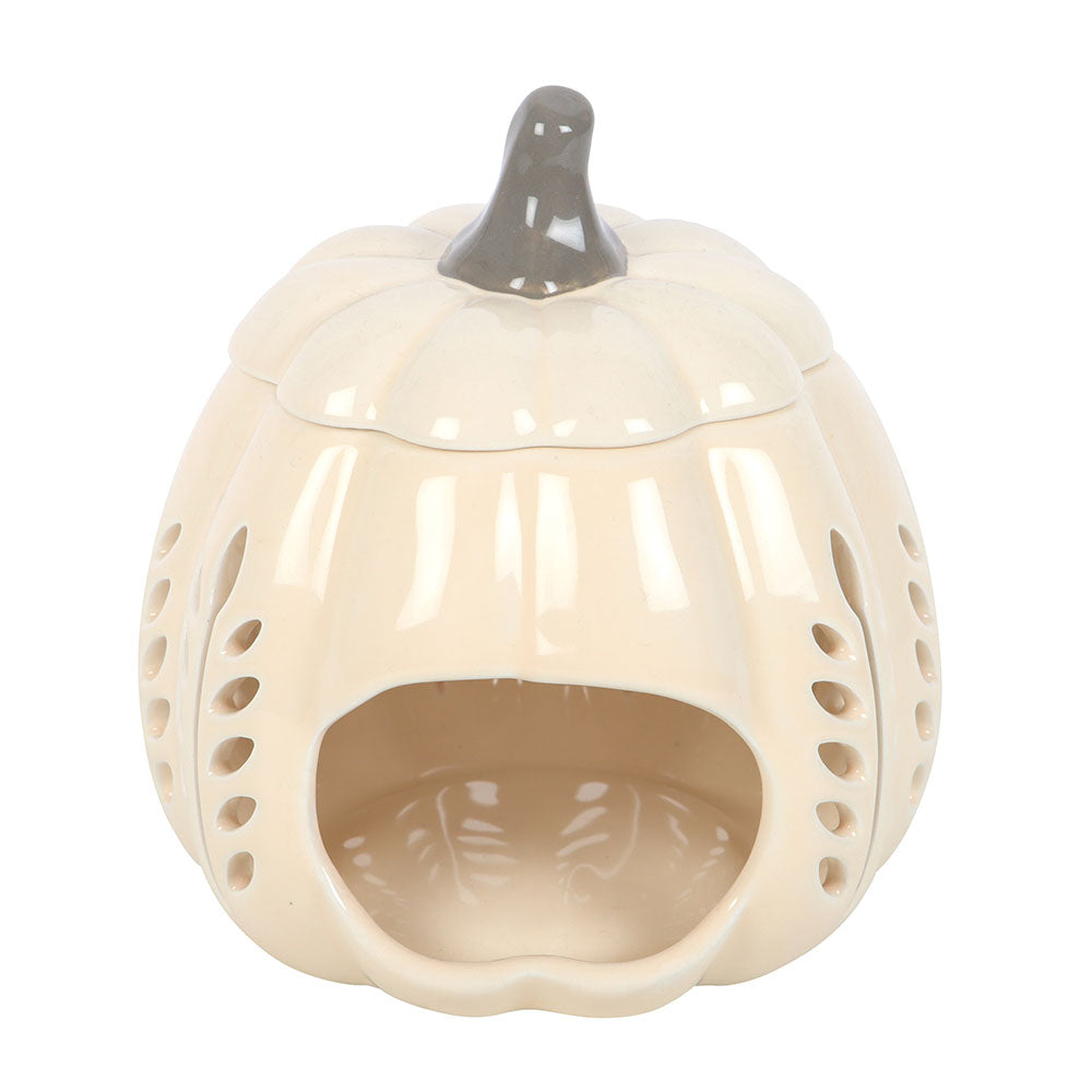 Ceramic pumpkin-shaped candle holder on a white background