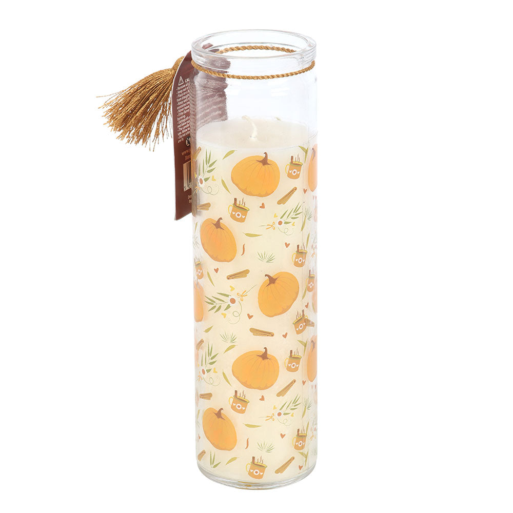 Candle in a glass jar with pumpkin design on a white background