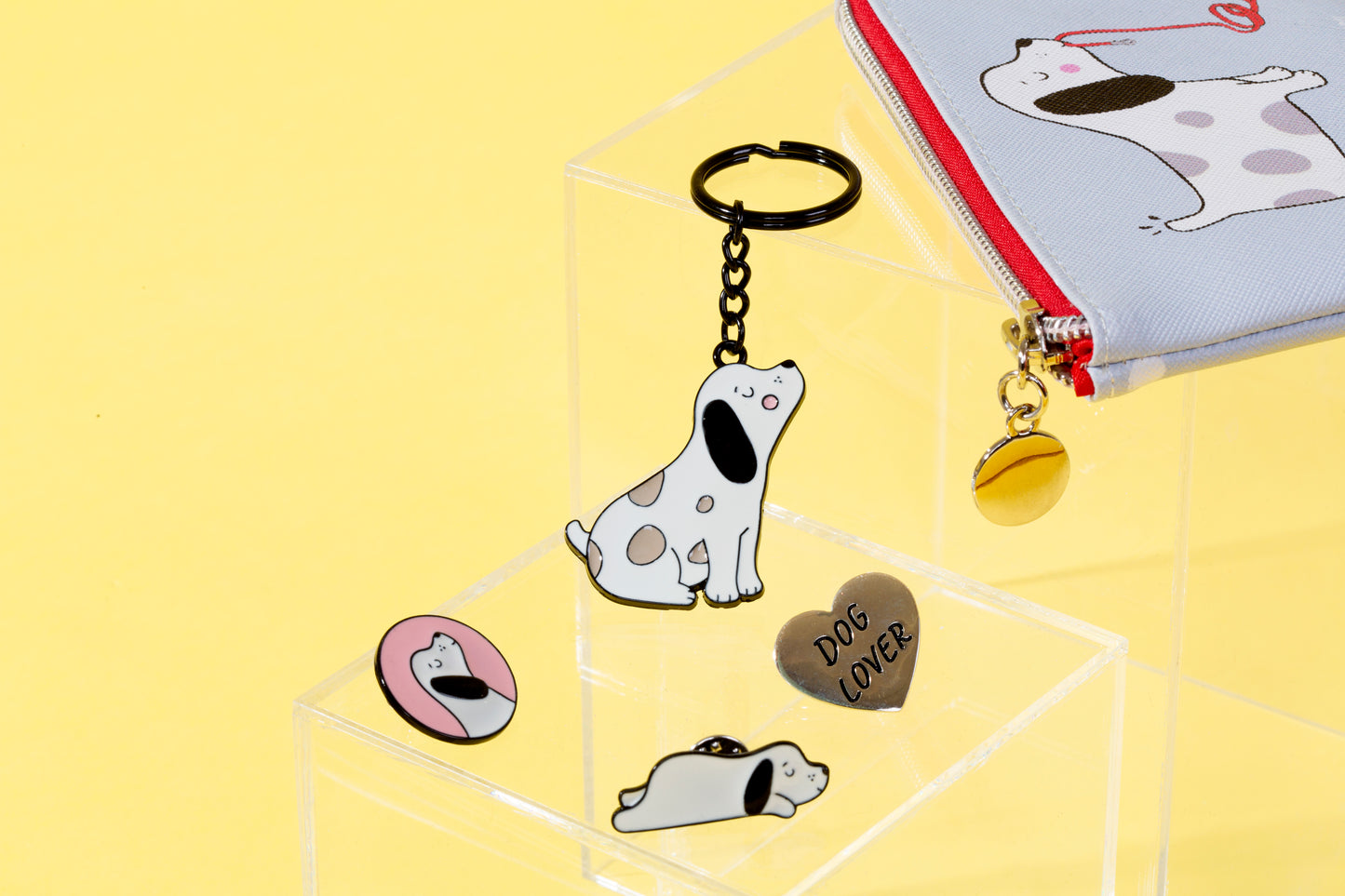 Spotty dog keyring on a yellow background