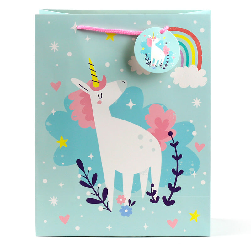 Gift bag with a unicorn design on a light blue background