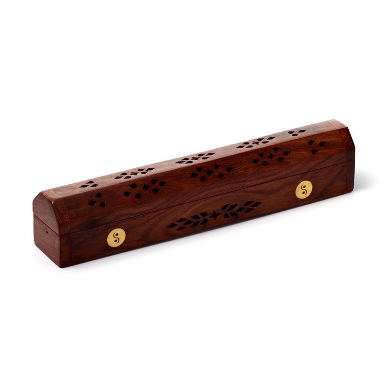 Wooden incense holder with gold accents on a white background