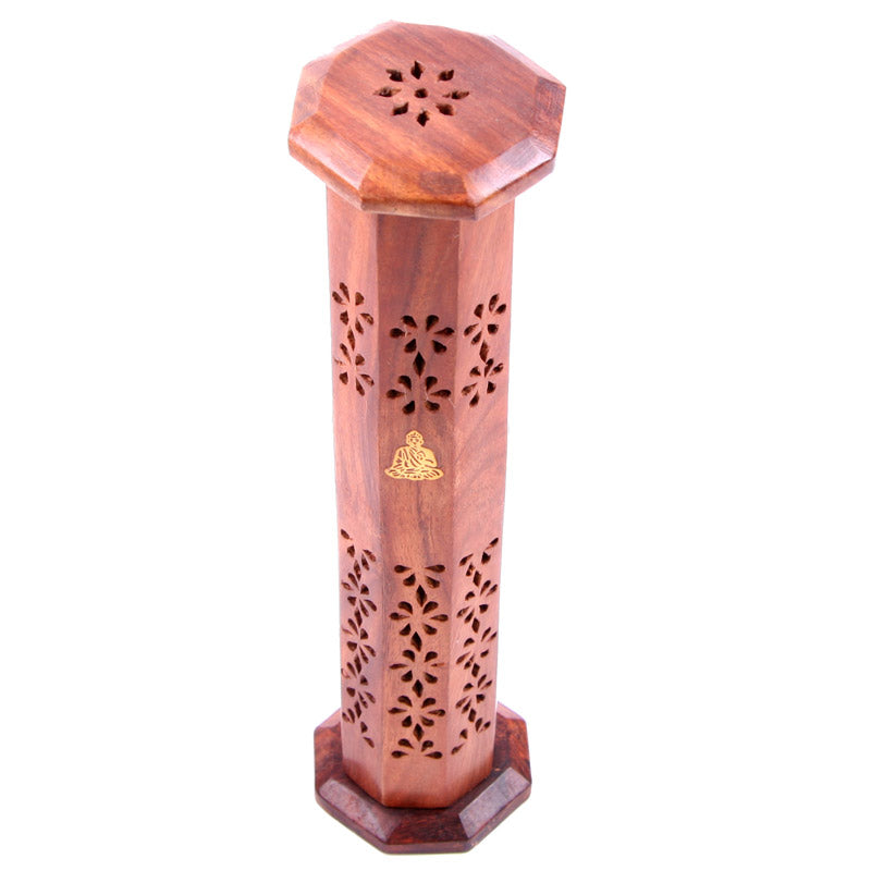 Wooden incense holder with floral patterns on a white background