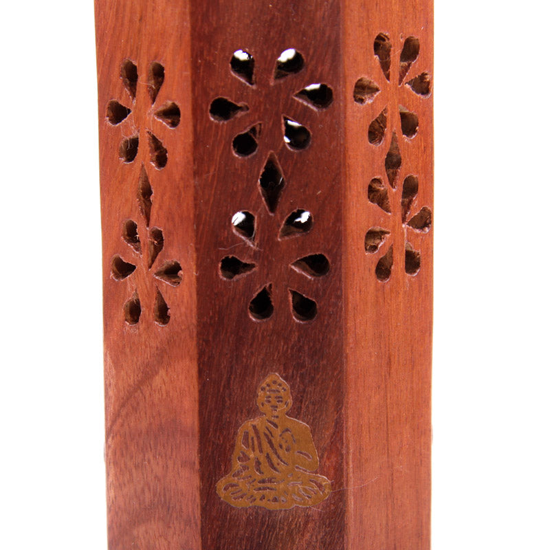 Wooden incense holder with floral patterns and a Buddha engraving on a white background