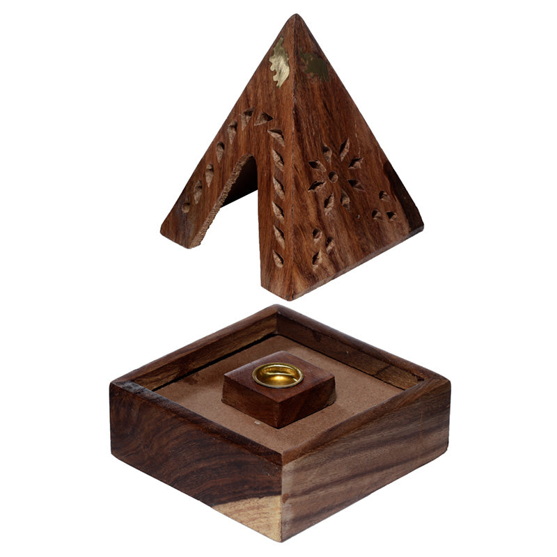 Wooden pyramid incense burner with decorative cut-out design on a white background