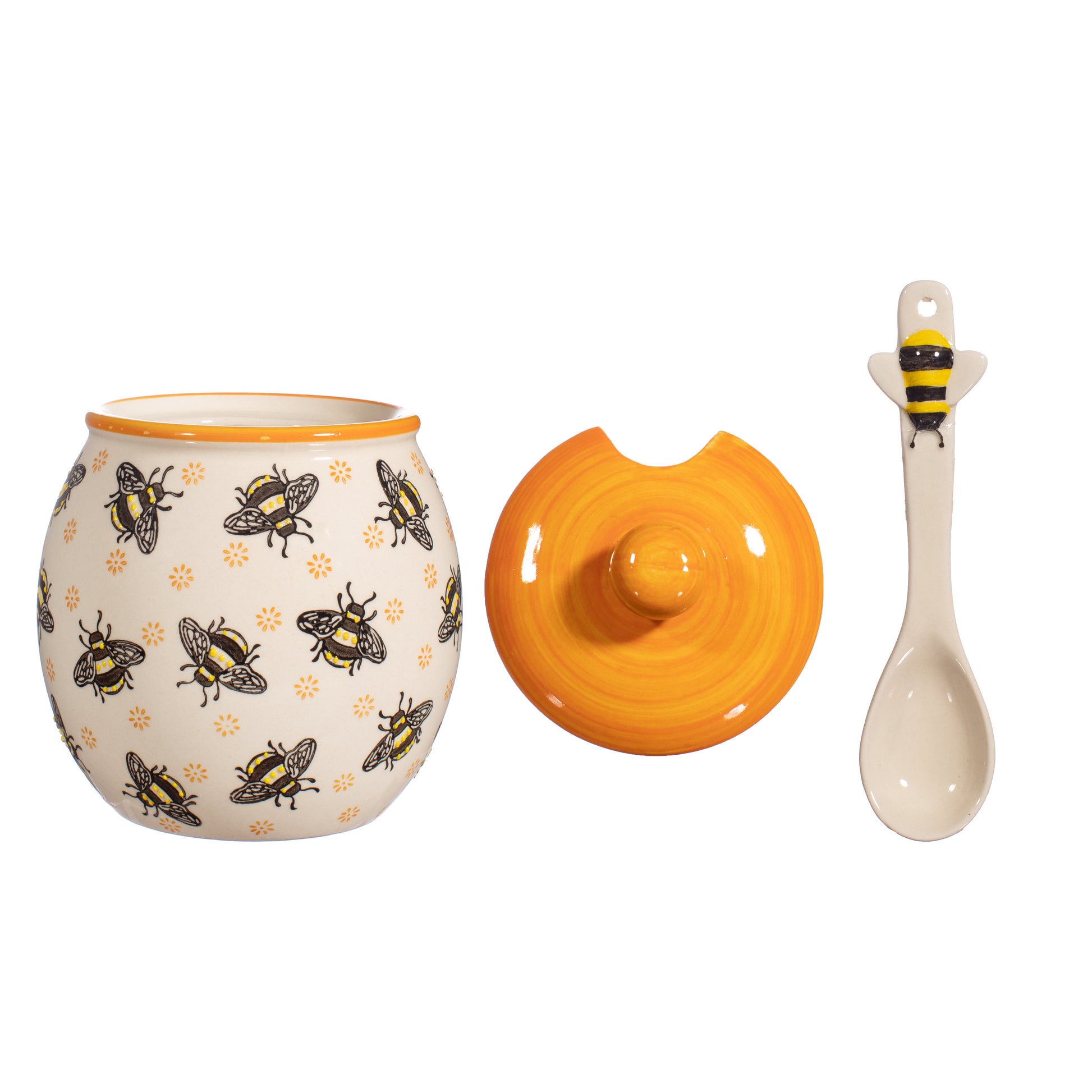 Bee themed honey jar on a white background