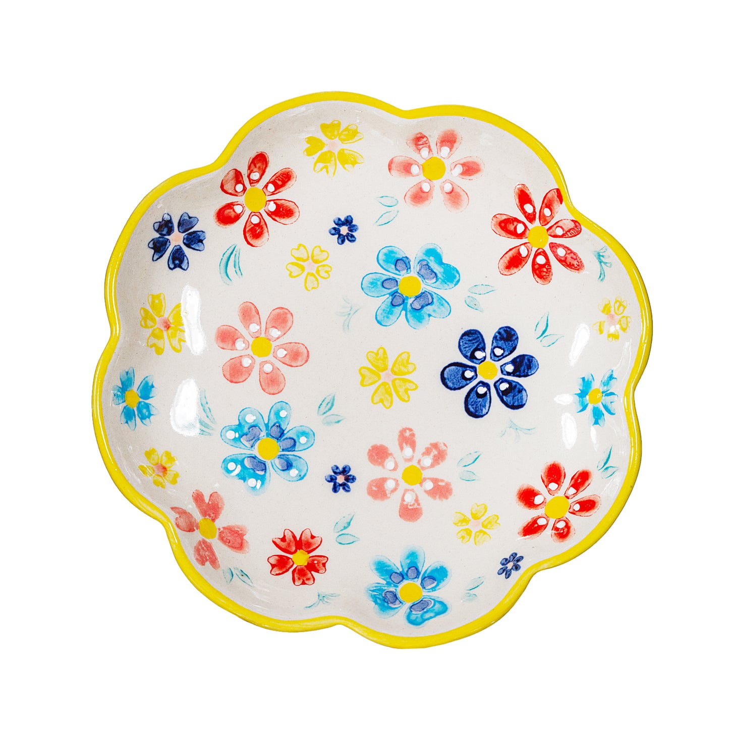 Multi coloured trinket dish on a white background