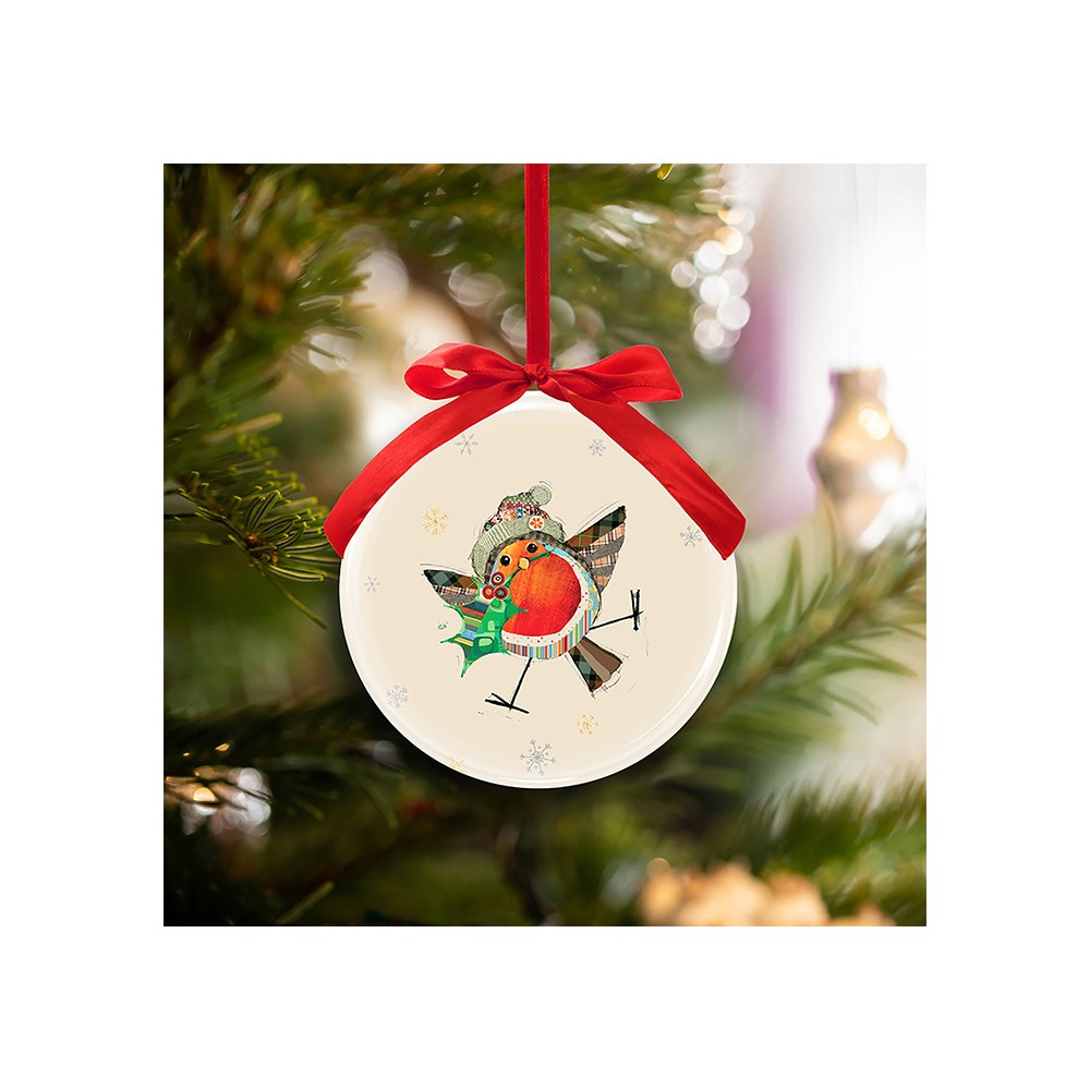 Christmas ornament with a robin design on a tree