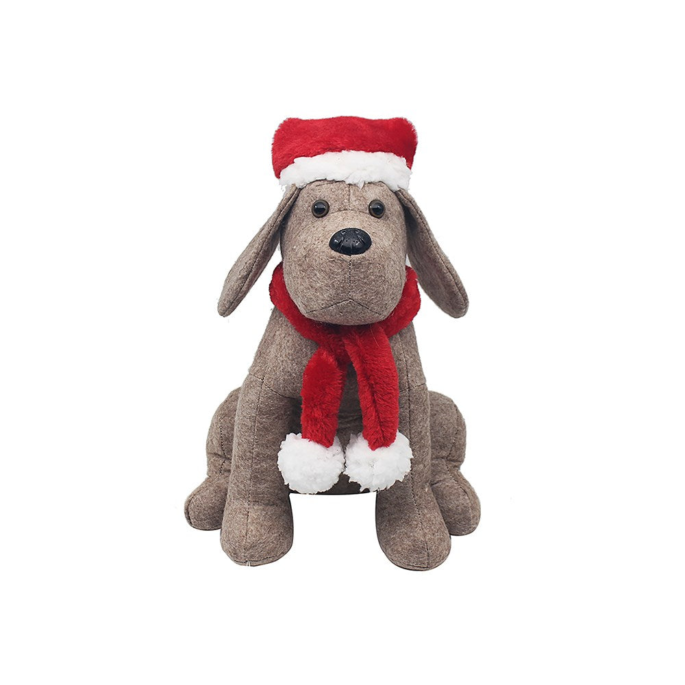 Plush dog toy with a red scarf and Santa hat on a white background