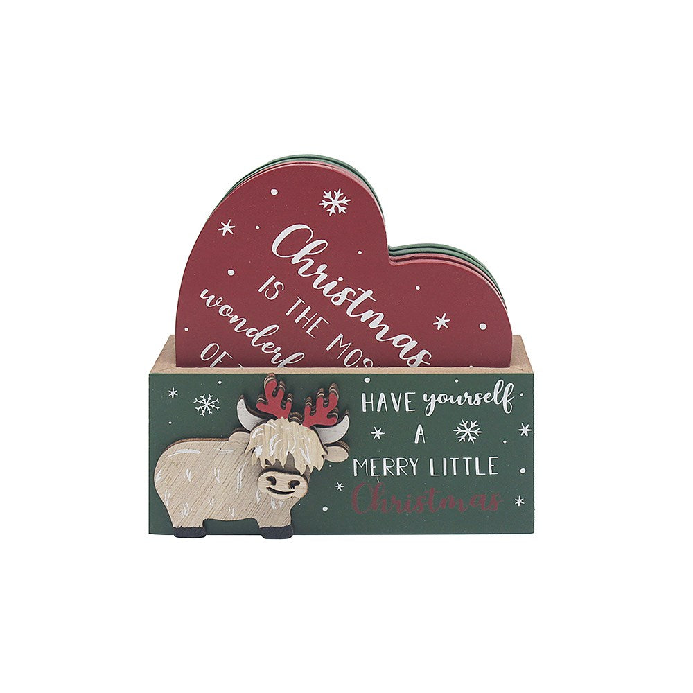 Red and green coasters in a green box with a Christmas themed highland cow on