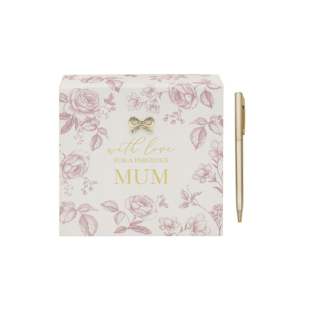 Floral notebook with 'For a fabulous Mum' text and a pen on a white background