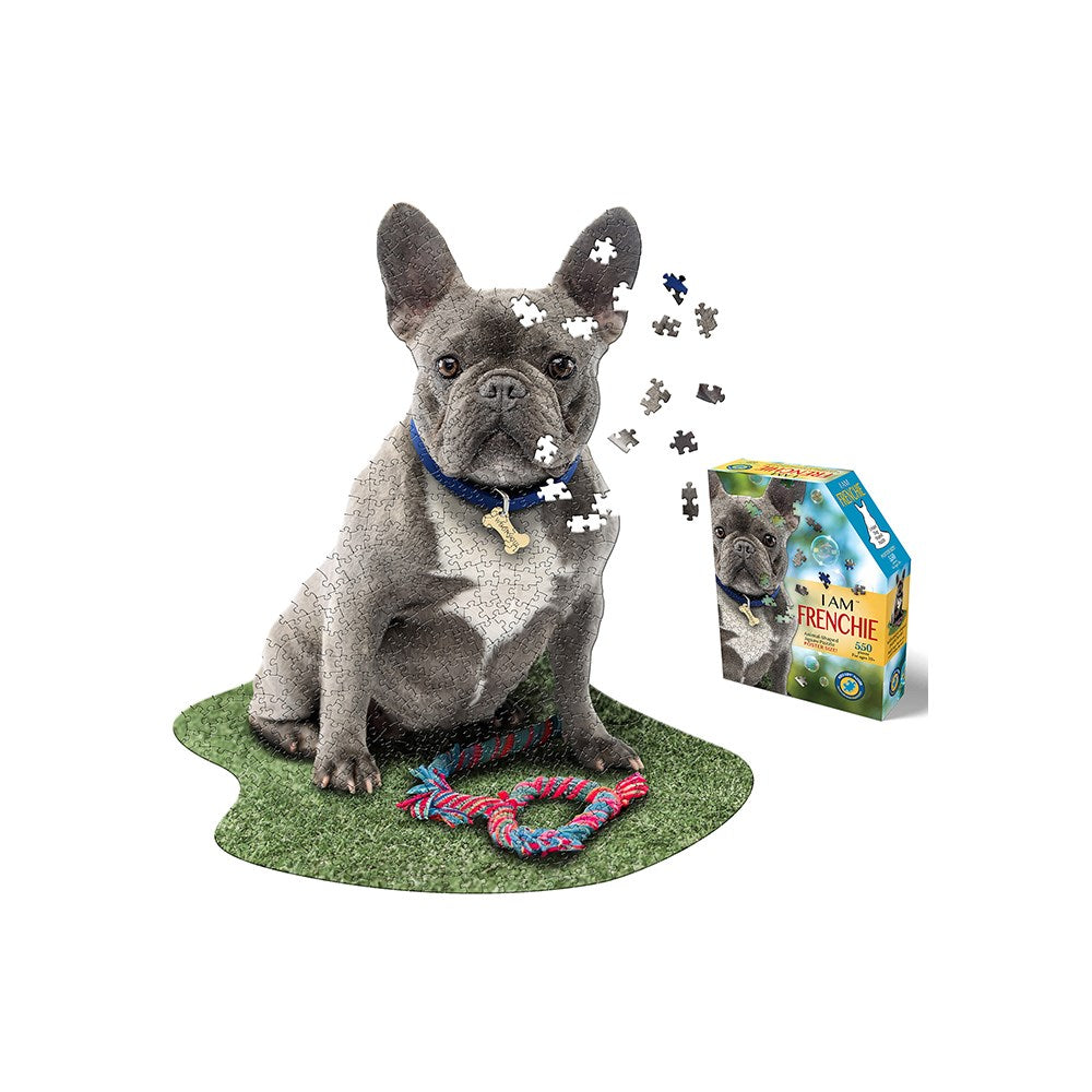 Dog with puzzle pieces, a toy, and a 'I am Frenchie' product on a white background