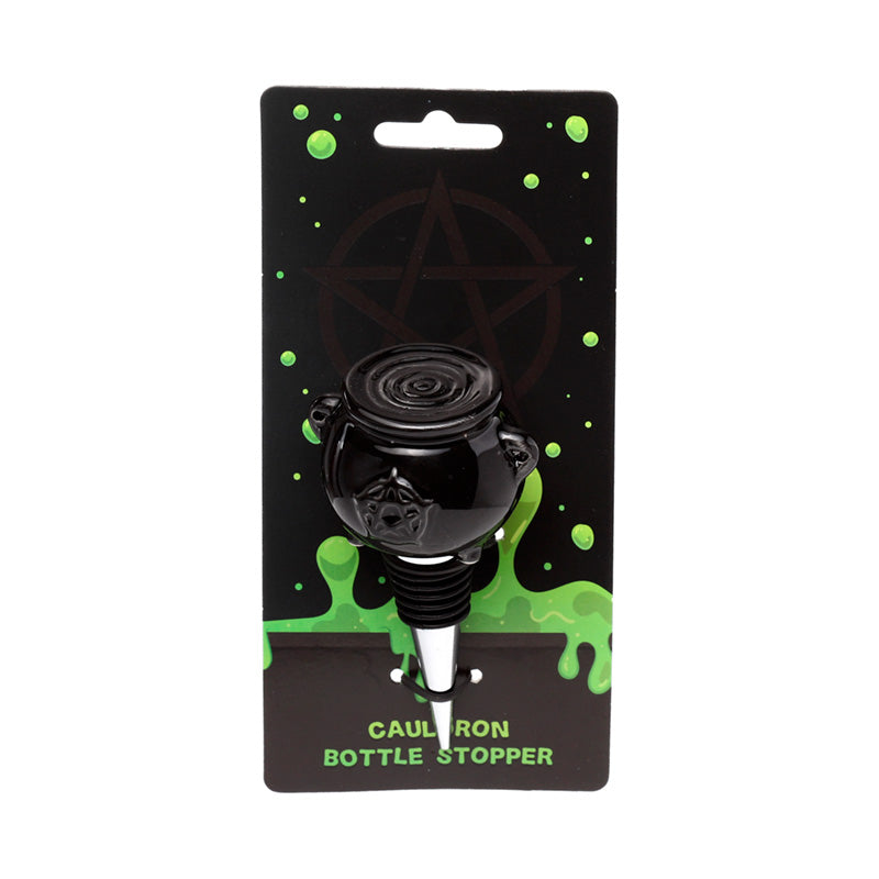 Black bottle stopper on a black packaging with green accents and text.