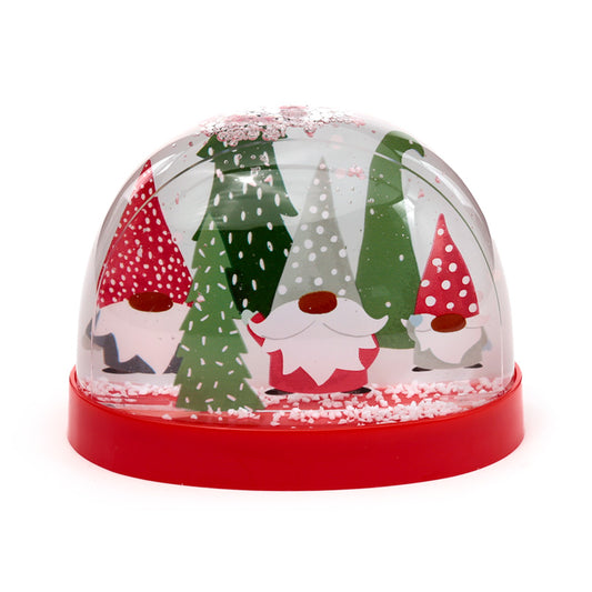 Christmas-themed snow globe with gnomes and trees on a white background