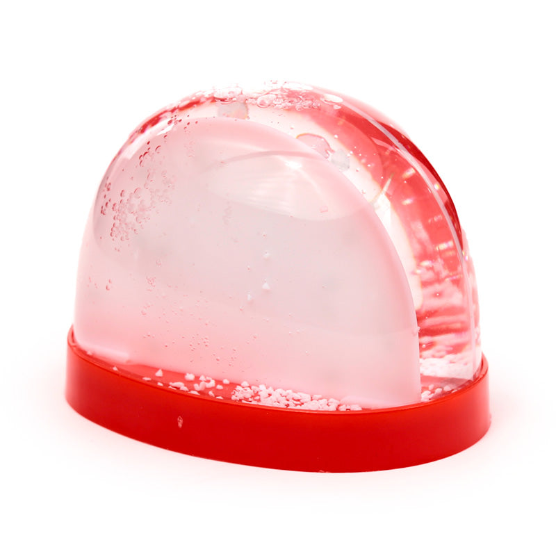 Christmas-themed snow globe with a deer design on a white background