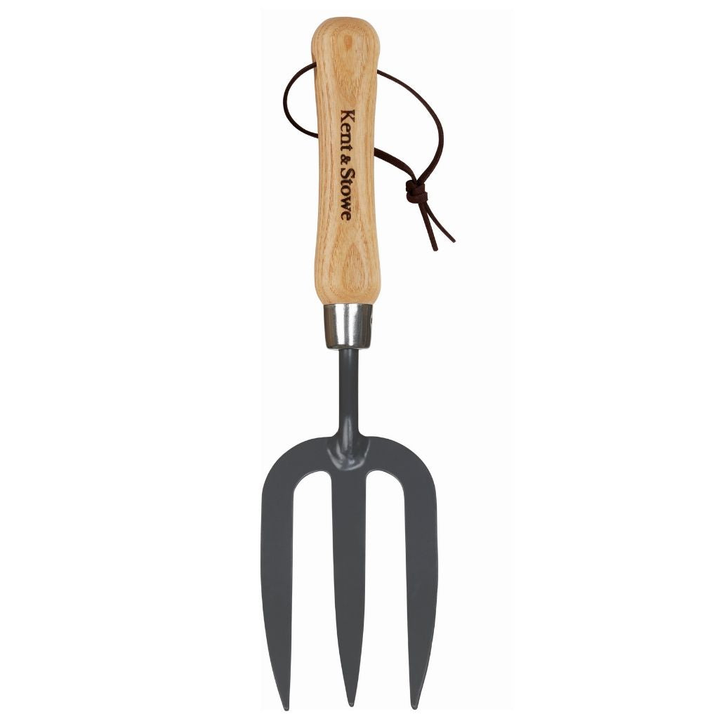 Gardening fork with wooden handle on a white background