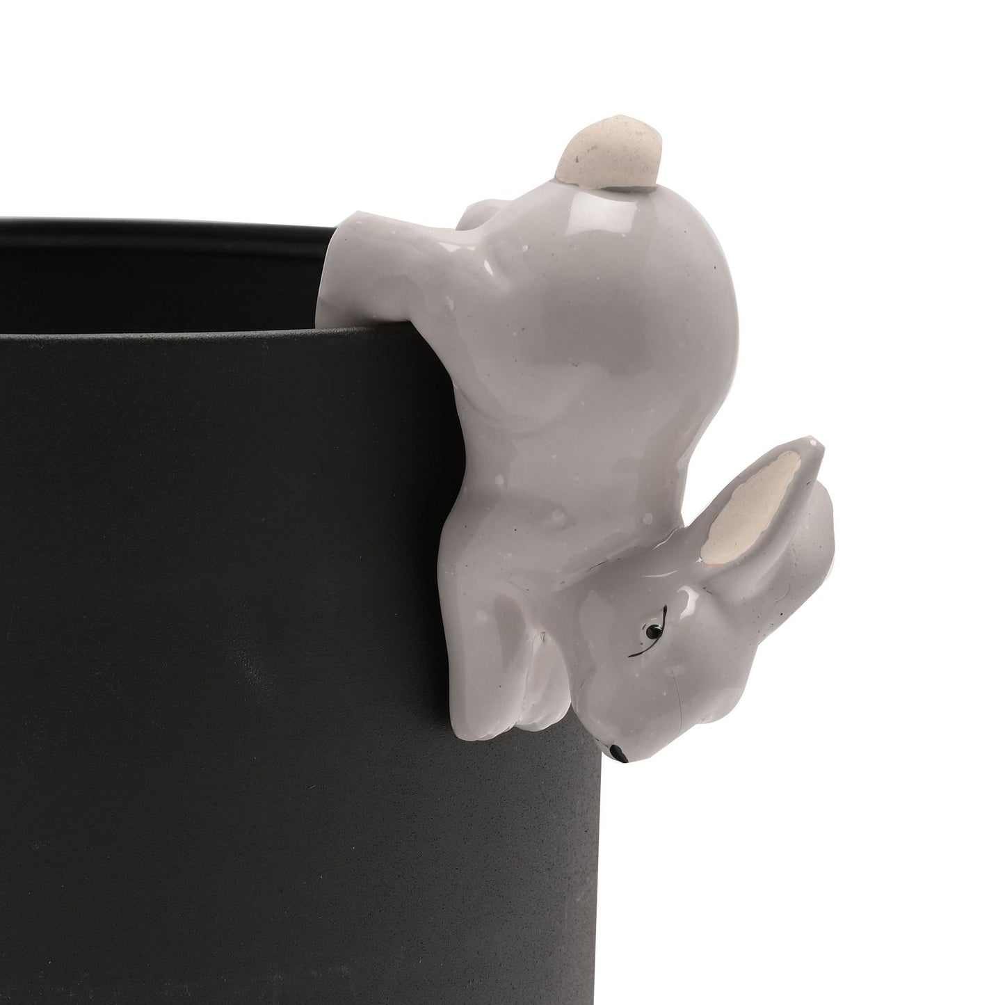 Gray ceramic planter with a rabbit design on a white background