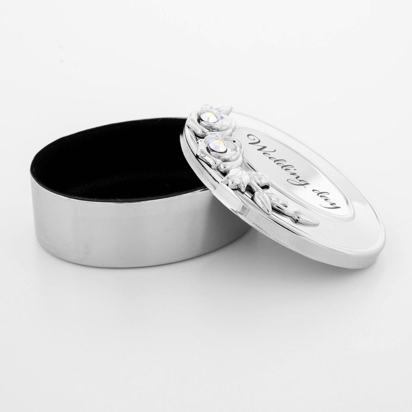 Silver trinket box with 'Wedding day' engraving on a white background