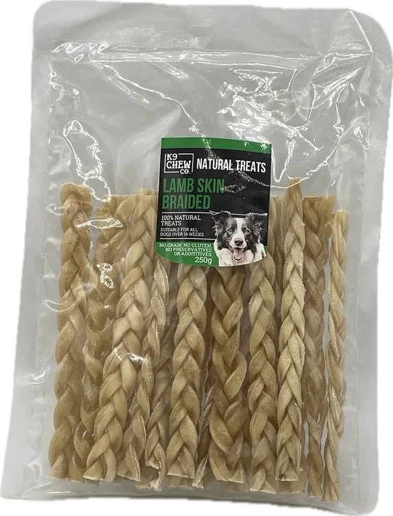 Package of dog treats labeled 'Lamb Skin Braided' with a visible brand logo.