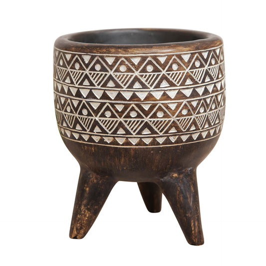 Decorative pot with tribal pattern on a white background