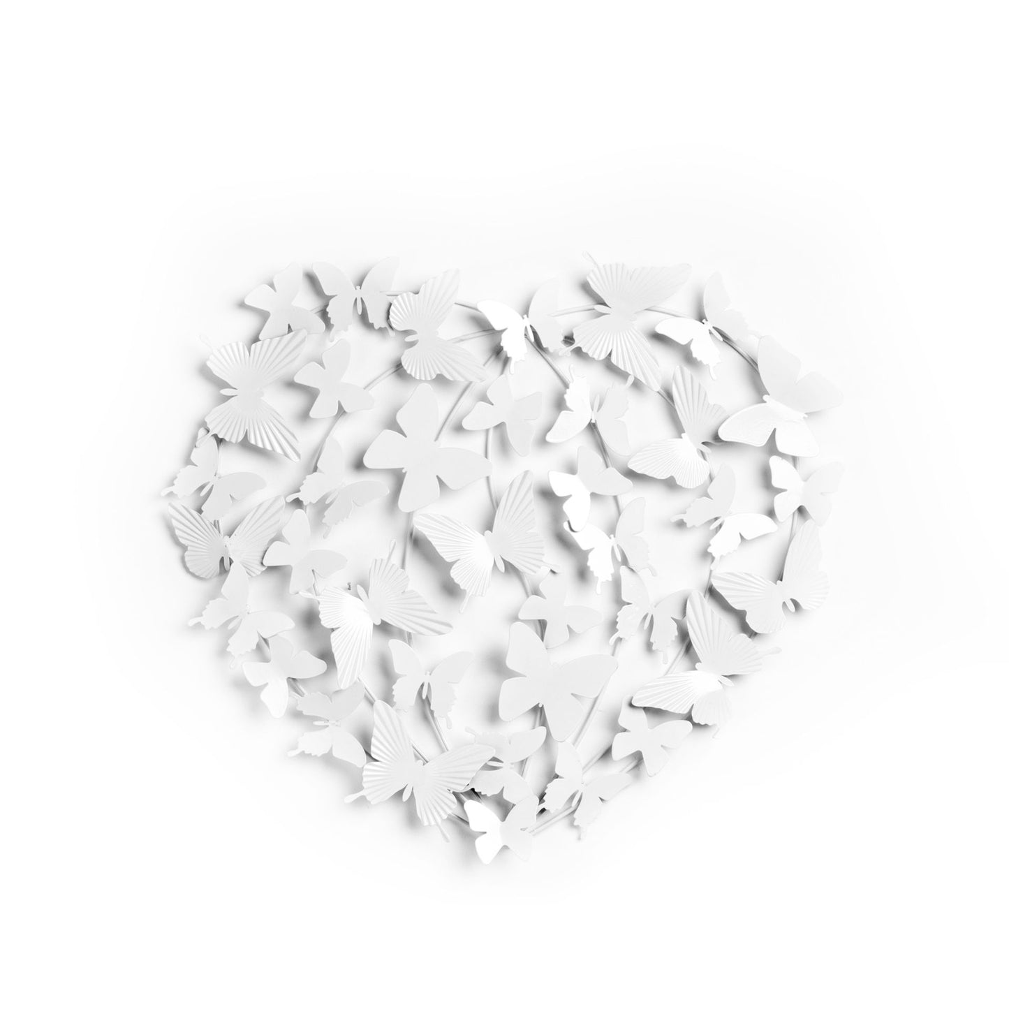 White butterfly cutouts scattered on a white background
