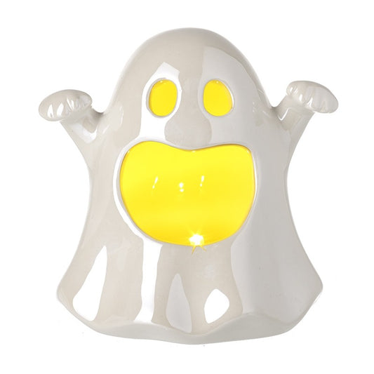 White ghost-shaped object with yellow center on a white background