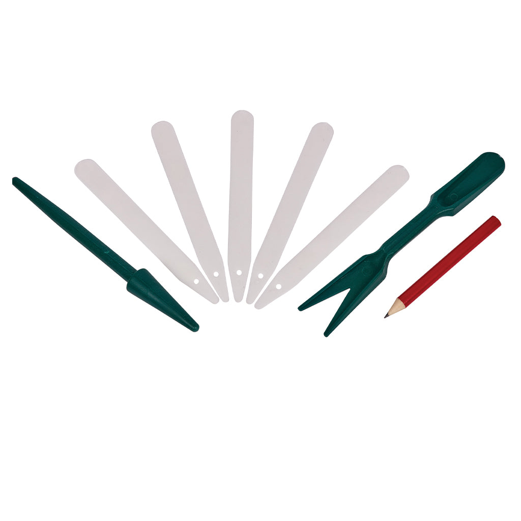 Set of gardening tools including trowels and a pencil on a white background