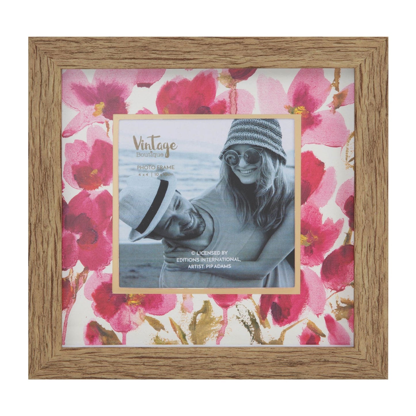 Wooden photo frame with floral design and a smaller photo of a person wearing sunglasses and a hat.