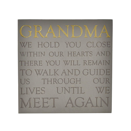 Decorative plaque with text about Grandma on a gray background