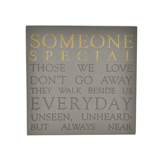 Decorative wall art with inspirational quote on a gray background