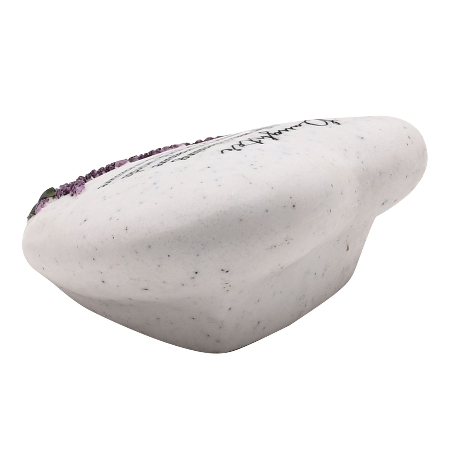 White stone with purple mineral inclusions on a white background
