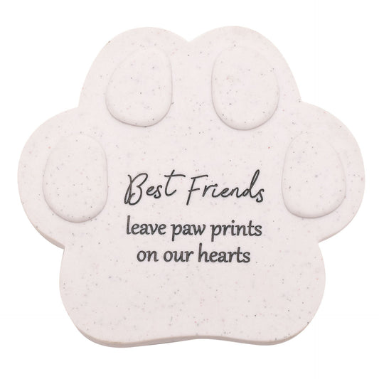 Paw-shaped decorative item with 'Best Friends leave paw prints on our hearts' text on a white background