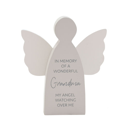 Memorial plaque shaped like an angel with engraved text on a white background