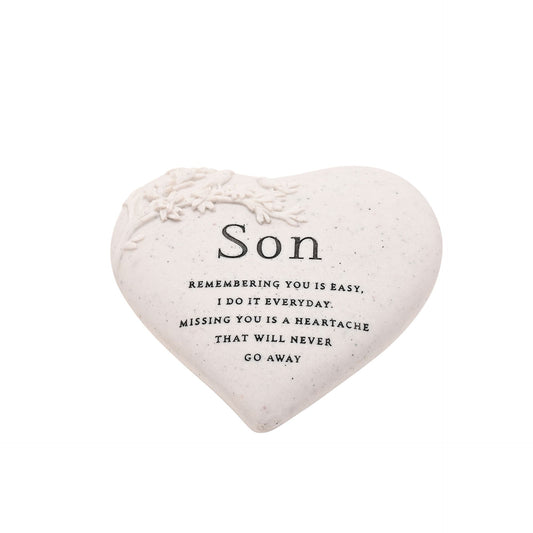 Heart-shaped pillow with text for a son on a white background