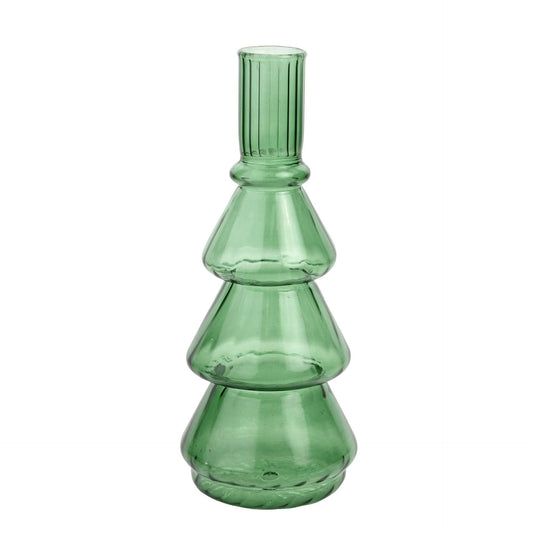 Green glass vase with a textured design on a white background