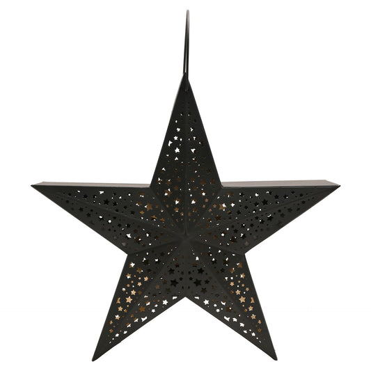 Black star-shaped lantern with cut-out patterns on a white background