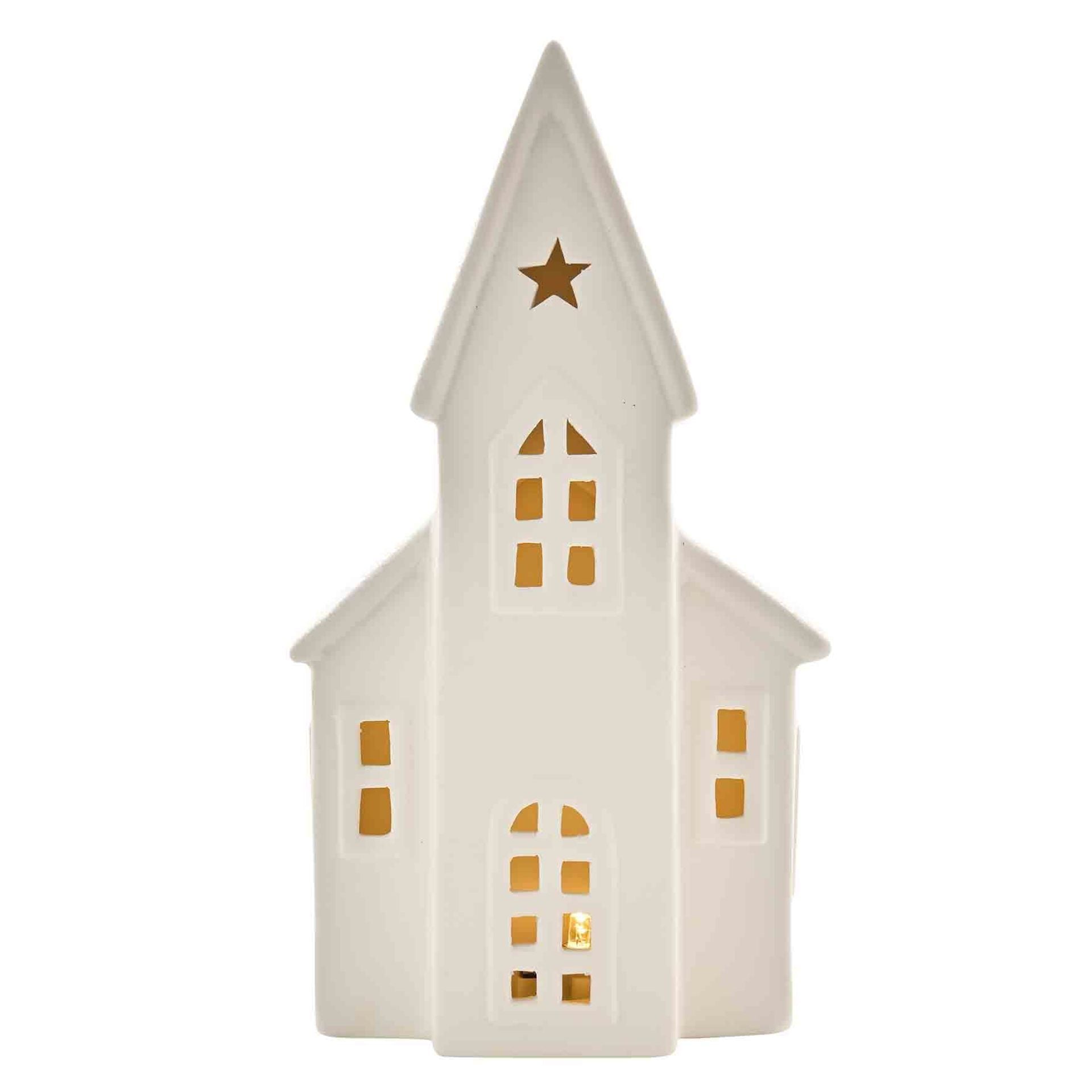 White house-shaped lantern with a star on top against a white background